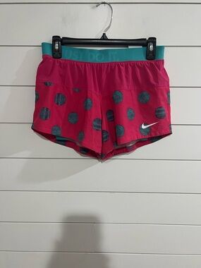 Nike Women's Fuchsia Athletic Shorts with Teal Polka-Dot Accents